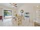 Bright dining nook with pool view and fish tank at 4490 Gillot Blvd, Port Charlotte, FL 33981