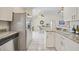 Bright kitchen boasts granite counters & stainless steel appliances at 4490 Gillot Blvd, Port Charlotte, FL 33981