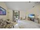 Comfortable living room with tiled floor and two armchairs at 4490 Gillot Blvd, Port Charlotte, FL 33981