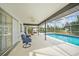 Inviting pool area with covered patio and seating at 4490 Gillot Blvd, Port Charlotte, FL 33981