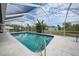Relaxing screened pool with pool steps at 4490 Gillot Blvd, Port Charlotte, FL 33981