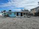 Beachfront property undergoing renovation, showing damage and debris at 45 Friendship Ln, Englewood, FL 34223