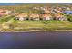 Stunning aerial of waterfront homes and lush landscape at 4628 Club Dr # H201, Port Charlotte, FL 33953