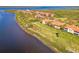 Waterfront community: Bird's eye view of homes and landscape at 4628 Club Dr # H201, Port Charlotte, FL 33953
