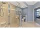 Bathroom with walk-in shower and toilet at 4628 Club Dr # H201, Port Charlotte, FL 33953