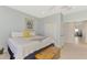 Main bedroom with king-size bed and walk-in closet at 4628 Club Dr # H201, Port Charlotte, FL 33953