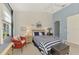 Comfortable bedroom with water views and nautical themed decor at 4628 Club Dr # H201, Port Charlotte, FL 33953