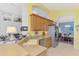Kitchen features light wood cabinets, a double sink, and granite countertops at 4628 Club Dr # H201, Port Charlotte, FL 33953