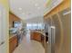Kitchen boasts stainless steel appliances and water views at 4628 Club Dr # H201, Port Charlotte, FL 33953