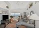Relaxing living room with comfortable seating and water views at 4628 Club Dr # H201, Port Charlotte, FL 33953