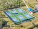 Eight well-lit pickleball courts with ample space at 4628 Club Dr # H201, Port Charlotte, FL 33953