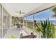 Peaceful screened balcony boasting scenic water views at 4628 Club Dr # H201, Port Charlotte, FL 33953