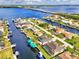 Aerial view of canal front home in a waterfront community at 5231 Conner Ter, Port Charlotte, FL 33981