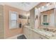 Bathroom with double vanity and granite top at 5231 Conner Ter, Port Charlotte, FL 33981