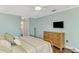 Bedroom with ensuite bathroom access and a large dresser at 5231 Conner Ter, Port Charlotte, FL 33981