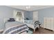 Bedroom with two twin beds and dresser at 5231 Conner Ter, Port Charlotte, FL 33981