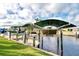 Private dock with two covered boat lifts at 5231 Conner Ter, Port Charlotte, FL 33981