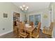 Bright dining area with sliding doors leading to outdoor patio at 5231 Conner Ter, Port Charlotte, FL 33981