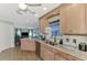 Eat-in kitchen with granite countertops and stainless steel appliances at 5231 Conner Ter, Port Charlotte, FL 33981