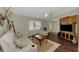 Light and airy living room featuring hardwood floors and neutral decor at 5231 Conner Ter, Port Charlotte, FL 33981