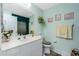Well-lit bathroom with single sink vanity at 5725 Greenwood Ave # 6204, North Port, FL 34287