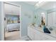 Bathroom with a vanity and view of bedroom at 5725 Greenwood Ave # 6204, North Port, FL 34287