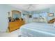 Bright bedroom with a comfortable bed and plenty of closet space at 5725 Greenwood Ave # 6204, North Port, FL 34287