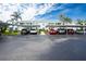 Covered parking area with ample spaces for residents at 5725 Greenwood Ave # 6204, North Port, FL 34287