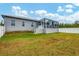 House with large backyard, grassy area and privacy fence at 6153 Pennell St, Englewood, FL 34224