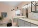 Bathroom with bathtub, vanity, and separate shower at 6153 Pennell St, Englewood, FL 34224