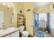 Bathroom with shower, toilet, and vanity at 6153 Pennell St, Englewood, FL 34224