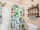 Bathroom with shower stall and a plant-themed shower curtain at 6153 Pennell St, Englewood, FL 34224
