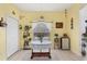 Cozy dining area with a round table and a window overlooking the outdoors at 6153 Pennell St, Englewood, FL 34224