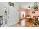 Simple dining room with wooden table and chairs, hardwood floors at 6153 Pennell St, Englewood, FL 34224