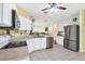 Kitchen boasts stainless steel appliances and ample counter and cabinet space at 6153 Pennell St, Englewood, FL 34224
