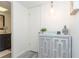 Bright bathroom with granite countertop vanity, and a large mirror at 66 Boundary Blvd # 280, Rotonda West, FL 33947