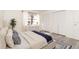 Spacious bedroom with a comfortable bed and ample closet space at 66 Boundary Blvd # 280, Rotonda West, FL 33947