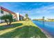 Tranquil canal-front property with lush landscaping at 66 Boundary Blvd # 280, Rotonda West, FL 33947