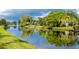 Serene waterway view, lush foliage and reflection at 66 Boundary Blvd # 280, Rotonda West, FL 33947