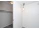 Closet with shelving for storage and light fixture at 66 Boundary Blvd # 280, Rotonda West, FL 33947