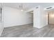 Empty dining area with gray wood-look floors at 66 Boundary Blvd # 280, Rotonda West, FL 33947