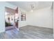 Bright dining area with gray wood-look floors at 66 Boundary Blvd # 280, Rotonda West, FL 33947