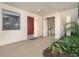 Exterior view showing private entrance with a shared laundry area nearby at 66 Boundary Blvd # 280, Rotonda West, FL 33947