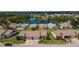 Community view showcasing homes, landscaping, and a lake at 660 Linden Dr, Englewood, FL 34223