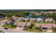 Community overview featuring lakefront homes and lush greenery at 660 Linden Dr, Englewood, FL 34223