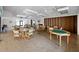 Community room with tables and chairs for gatherings at 660 Linden Dr, Englewood, FL 34223