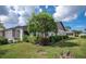Updated home with nicely landscaped yard at 660 Linden Dr, Englewood, FL 34223