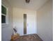 White front door entryway with glass sidelights, leading into the home at 660 Linden Dr, Englewood, FL 34223
