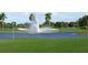 Picturesque golf course with water fountain at 660 Linden Dr, Englewood, FL 34223