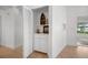 Built-in storage closet with shelving and decorative nautical items at 660 Linden Dr, Englewood, FL 34223